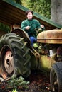 Country Lady Driving Old Tractor Royalty Free Stock Photo