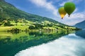 Country landscape, Olden, Norway. Hot air balloons