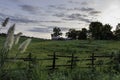 Country landscape of red barn on a hill Royalty Free Stock Photo