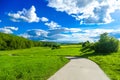 Country lane with blue sky Royalty Free Stock Photo