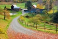 A country lane leads to a bucolic farm Royalty Free Stock Photo