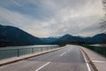 Country road along Faller Klamm Bridge across Lake Sylvenstein Royalty Free Stock Photo