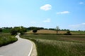 Fields with blue sky, clouds and trees in the Dachau hinterland, Bavaria, near Munich