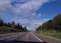 Country Road, cloudy sommar fourney in Sweden Royalty Free Stock Photo