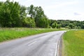 a bad country road in idyllic Eifel landscape Royalty Free Stock Photo