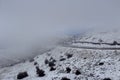 Country road in the highlands Greece, Peloponnese on a winter, snowy day Royalty Free Stock Photo