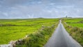 Country road leading to Moher Tower at Hags Head in Cliffs of Moher, Ireland