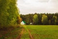 Country road leading to the summer house in the middle of the forest. Royalty Free Stock Photo
