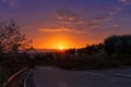 country road leading to Tortoreto on the Adriatic Sea in Abruzzo with a colourful sunrise sky