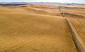 Country road leads through the rich fertile fields on the Palouse Royalty Free Stock Photo