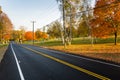 Country Road Lit by a Warm Autumnal Setting Sun Royalty Free Stock Photo