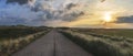 Country road panorama at sunrise on Sylt island Royalty Free Stock Photo