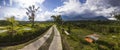 Country road at rice fields of Jatiluwih in southeast Bali Royalty Free Stock Photo