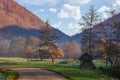 country road through rural valley in morning light Royalty Free Stock Photo