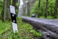 country road in Germany with reflector post Royalty Free Stock Photo