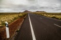 Country road between volcanic landscape Lanzarote Canary Islands Spain