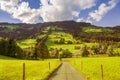Country road in Westendorf, Brixental Valley in Tirolean Alps, Austria, Royalty Free Stock Photo