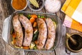 Country sausage with vegetables baked in the shape of glass Royalty Free Stock Photo