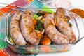 Country sausage with vegetables baked in the shape of glass Royalty Free Stock Photo