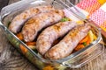 Country sausage with vegetables baked in the shape of glass Royalty Free Stock Photo