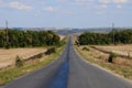 Country summer landscape with a road. Hitch-hiking on the roadside Royalty Free Stock Photo