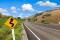 Country winding road blue sky