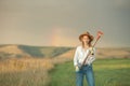 Country woman in field with pitchfork Royalty Free Stock Photo