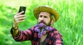 Countryman making selfie on phone. protect green environment. Agriculture farmer rest after day work. Worker in rural