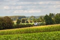 Countryscape fields and passenger train Royalty Free Stock Photo