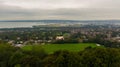 Countryside, aerial view on houses near coast of Irish sea in Belfast Northern Ireland. Cloudy sky above seaside Royalty Free Stock Photo