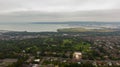 Countryside, aerial view on houses near coast of Irish sea in Belfast Northern Ireland. Cloudy sky above seaside Royalty Free Stock Photo