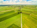 Countryside and field seen from the bird`s eye view. Crop fields stretching to the horizon.