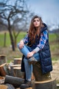 Countryside girl in jeans and plaid shirt Royalty Free Stock Photo