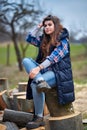 Countryside girl in jeans and plaid shirt Royalty Free Stock Photo