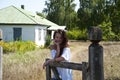 Countryside happy woman in summer at village cottage house outdoor Royalty Free Stock Photo