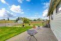 Countryside house exterior with concrete floor walkout patio