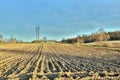 Countryside landscape of plowed field in autumn with selective focus Royalty Free Stock Photo