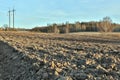 Countryside landscape of plowed field with selective focus Royalty Free Stock Photo