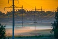 countryside misty sunrise, electric poles landscape