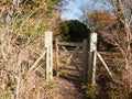 countryside open gate public pathway wooden fence boundary autumn Royalty Free Stock Photo