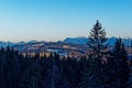 View to alpine mountain chain landscape in late winter by sun setting