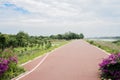 Countryside red-painted way in cloudy summer afternoon Royalty Free Stock Photo