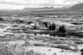 Countryside with river, church, houses on mountain landscape in Iceland