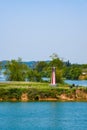 Countryside riverside scenery and sailing lighthouse