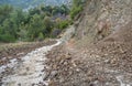 Countryside road blocked by a rockfall in mountain area of Cyprus Royalty Free Stock Photo