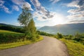 Countryside road in mountains on a sunny day Royalty Free Stock Photo