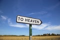 In the countryside a road sign with the inscription heaven. Royalty Free Stock Photo