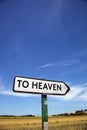 In the countryside a road sign with the inscription heaven. Royalty Free Stock Photo