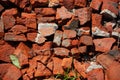 Countryside road surface made of broken red bricks. Royalty Free Stock Photo