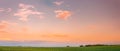 Countryside Rural Field Landscape Under Scenic Sunset Sky. Spring Agricultural Landscape. Panorama, Panoramic View Royalty Free Stock Photo